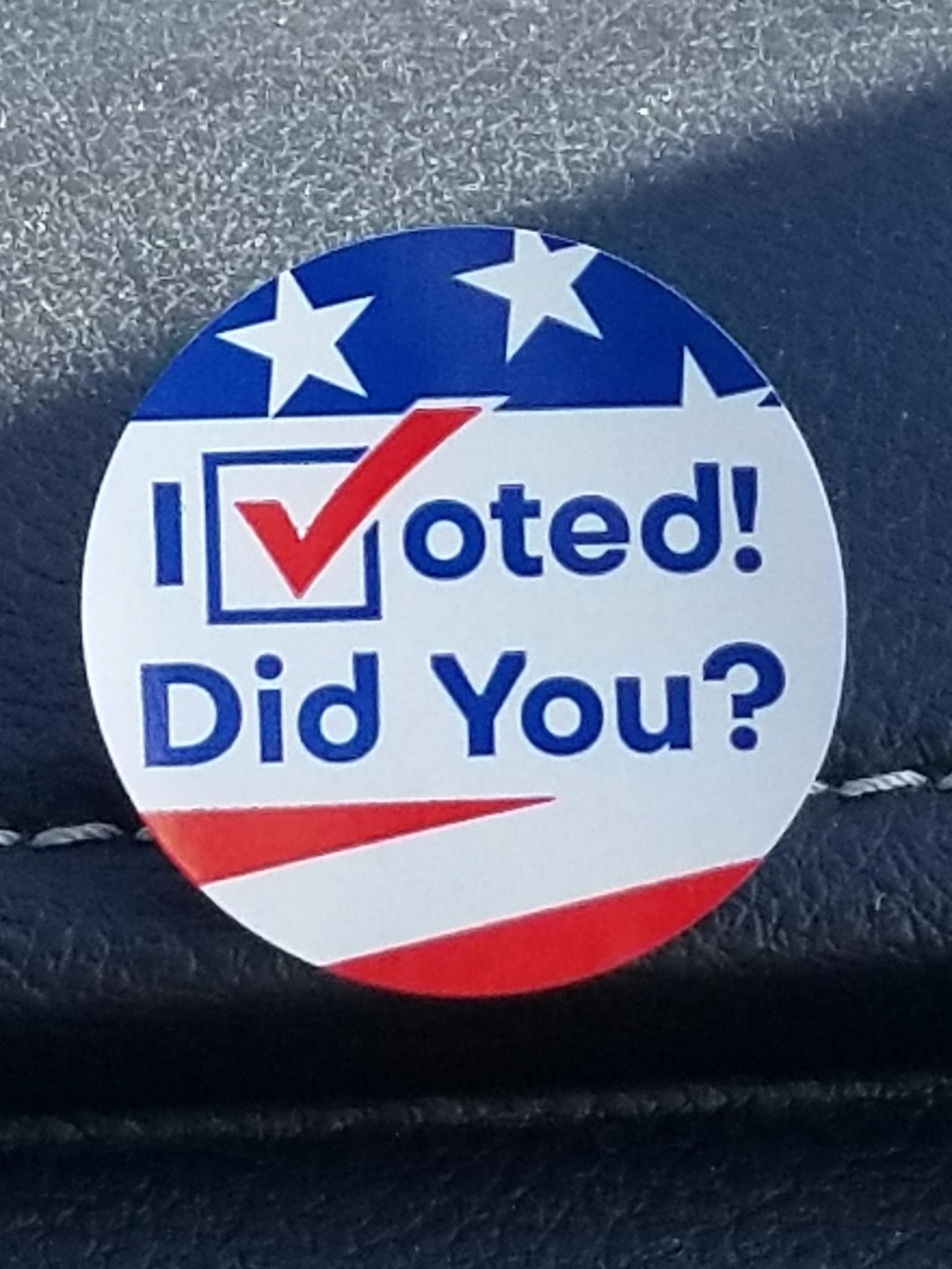 A sticker says 'I voted! Did you? with the 'V' stylized as a check-mark.