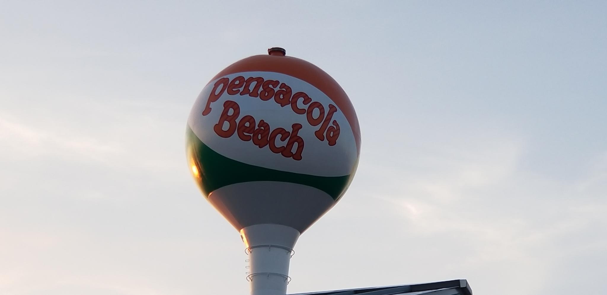 The Pensacola beach water tower, which resembles a beach ball, as viewed from below.