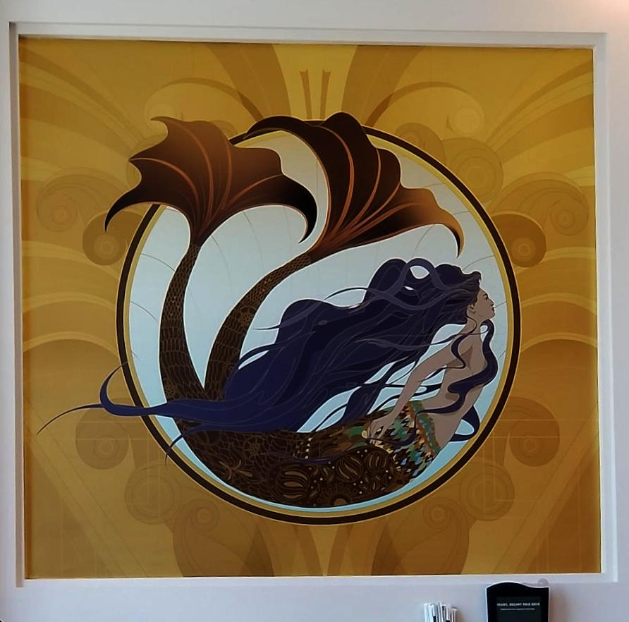 A painting portrays a mermaid swimmping in a circular pattern. The color-scheme is coffee-brown and the style is art-deco.