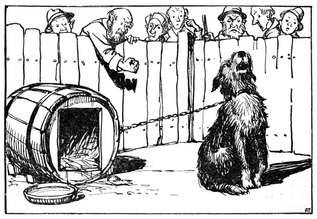 A man shakes his fist at a howling dog.