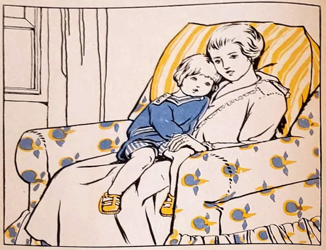 A child sits on her mother’s lap.