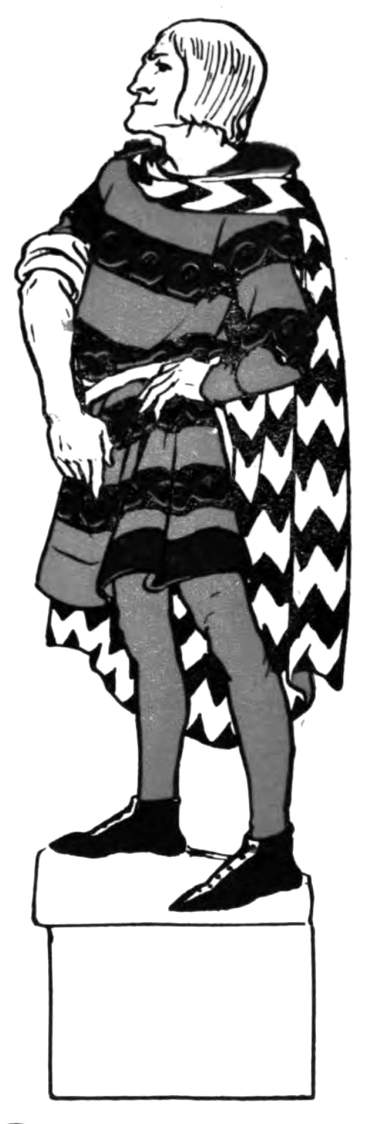 A man stands, hand upon his hip.