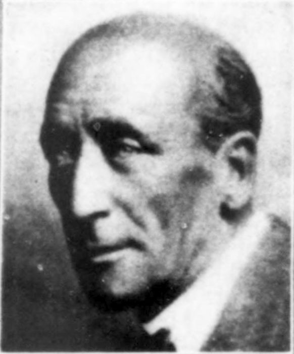 A portait of Blackwood's face. [Caption] 'Real living is an interior affair.'