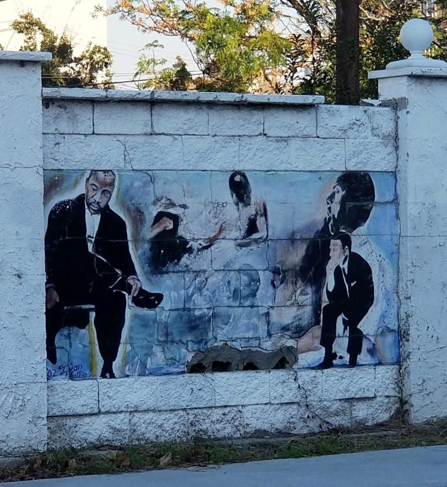 Mural, on the side of a street in New Orleans.