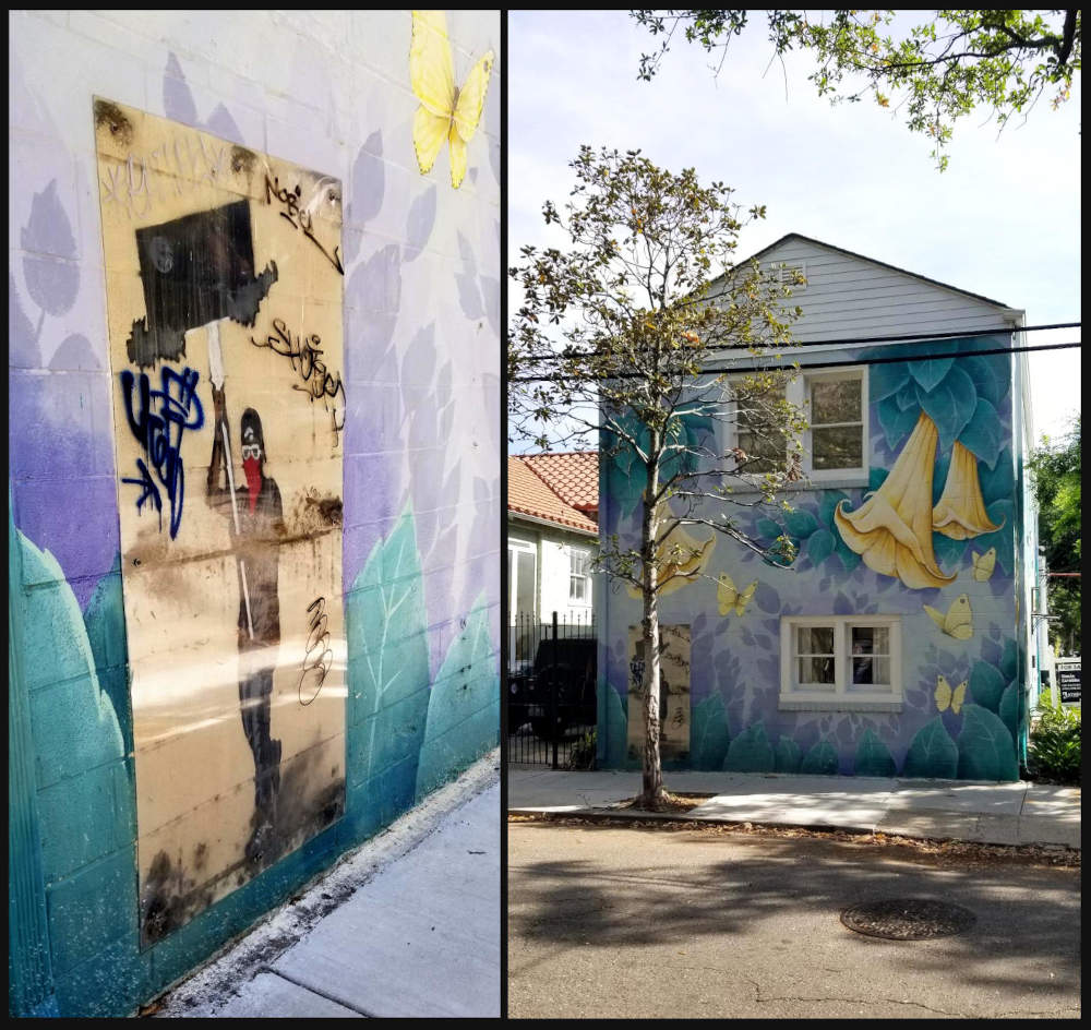 Loĝejo en Nov-Orleano, kovrita per flora murpentraĵo krom malgranda pli malnova pentraĵo de maskita protestanto portanta ŝildon.