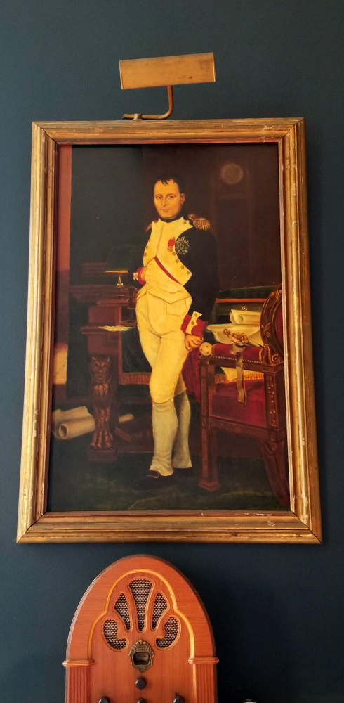 Reproduktaĵo de 'La Imperiestro Napoleono en sia Studĉambro ĉe la Tuileries'.