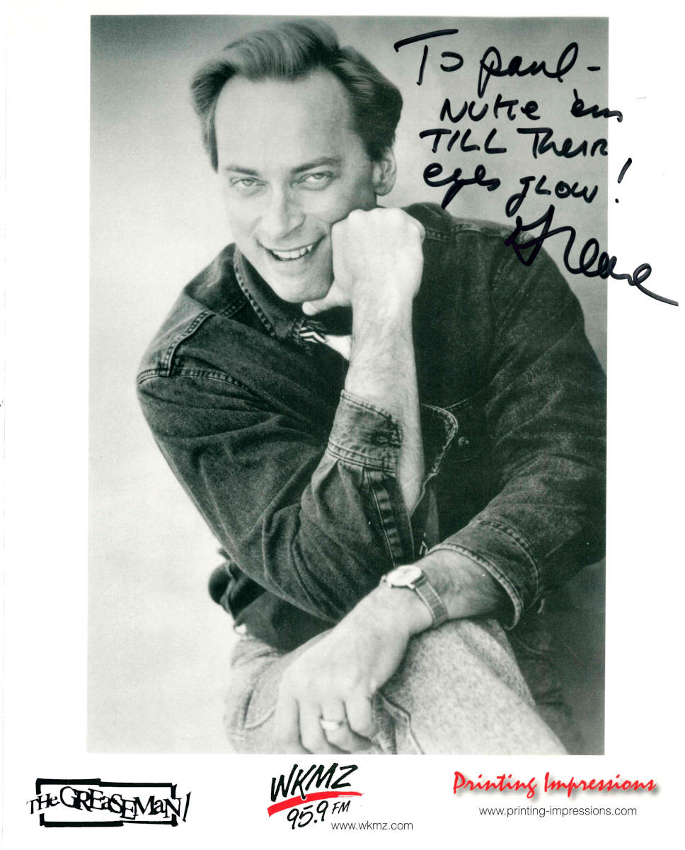 Photograph of Doug Tracht in 1998, labeled The Greasman, inscribed "To Paul⁠—⁠ Nuke 'em till their eyes glow! ⁠—⁠Grease".