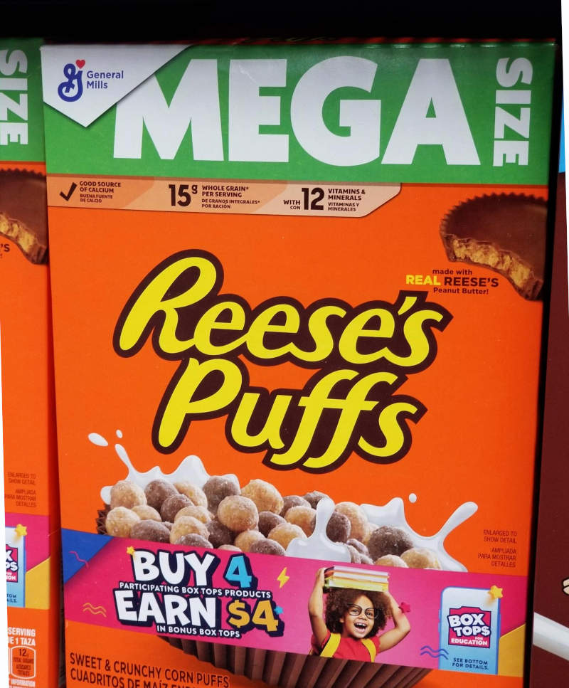General Mills Mega Size Reese's Puffs made with Real Reese's Peanut Butter, Sweet and Crunchy Corn Puffs.